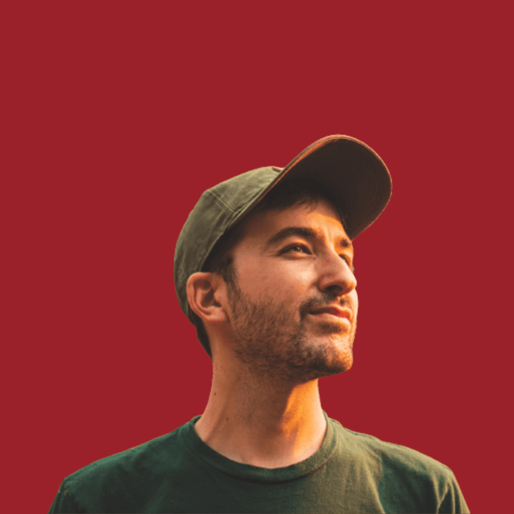 Man envisioning career growth on a red background